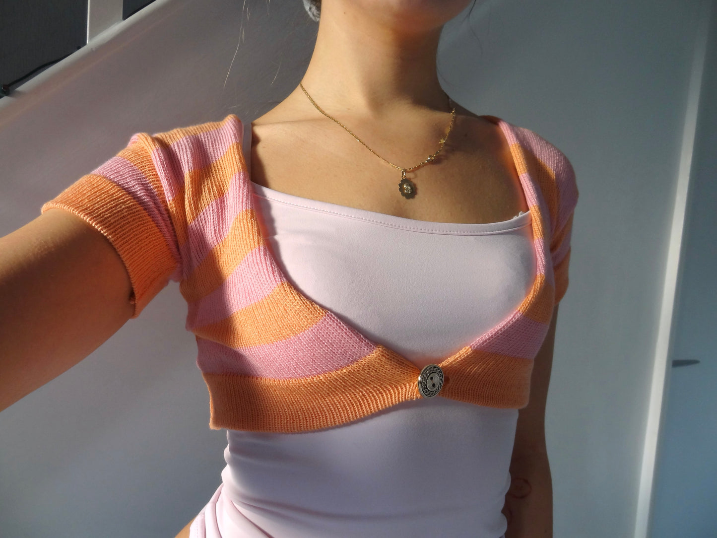 Zari stripped cardi in peach