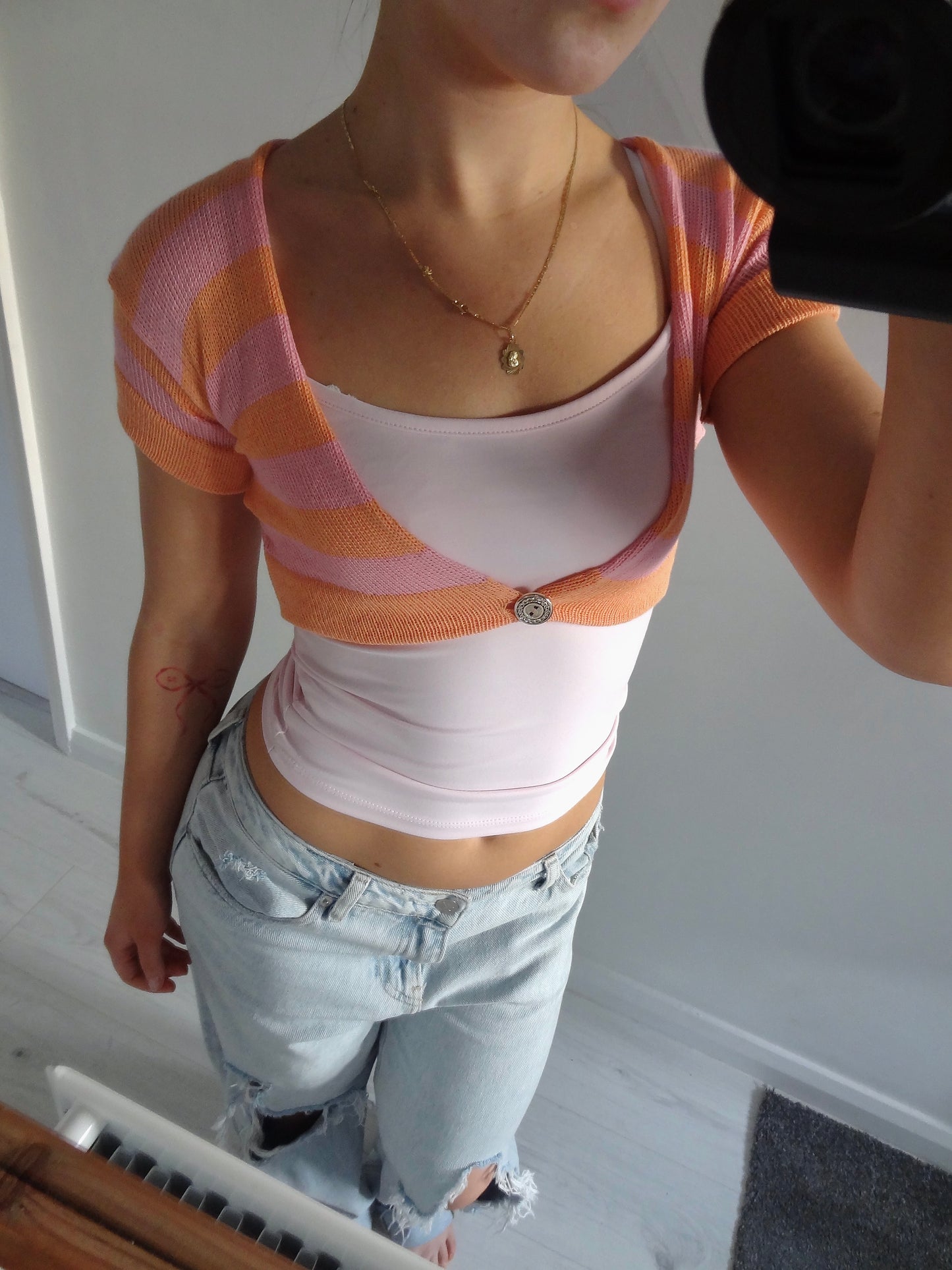 Zari stripped cardi in peach